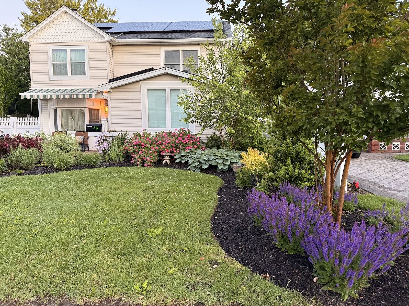 A front-yard landscape by Independent Lawn Service